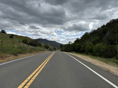 Curvy road through a landscape.